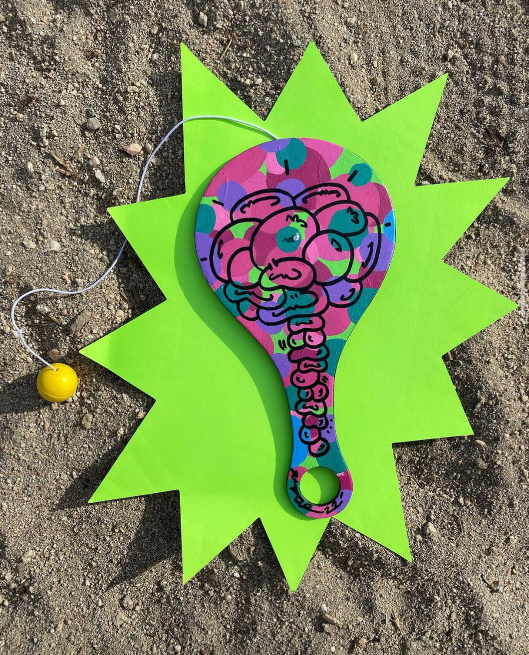 A PADDLE BALL OF COLOUR